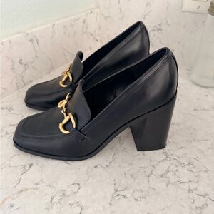 Marc Fisher Black Heels with Gold Detail. Never worn, Excellent condition